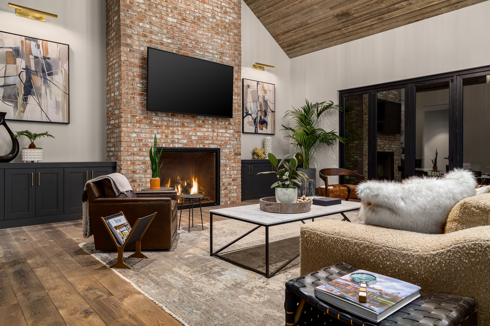 Living room with brick fireplace